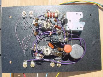 Homemade two tube regenerative radio inside.